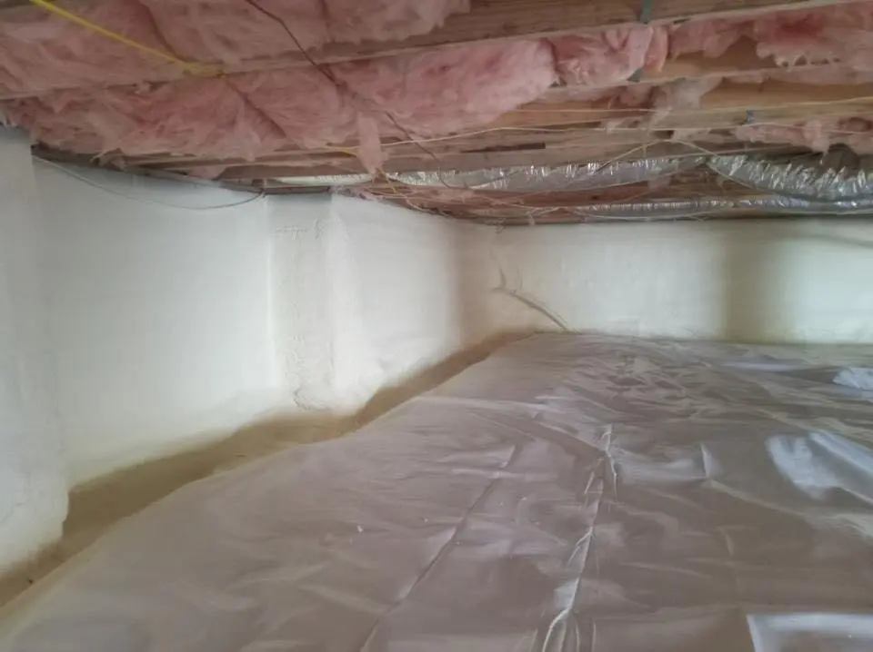 Crawl space encapsulation with closed-cell spray foam for Commercial Roof Restoration in Eau Claire